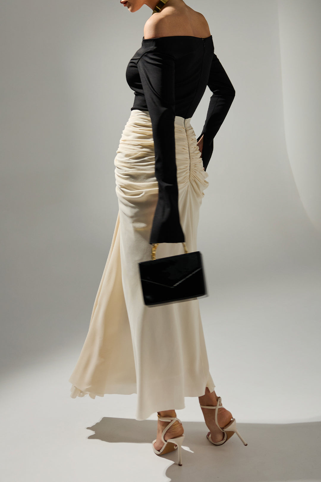 black and cream dress accessories The perfect combination of a flowing cream maxi dress, classic black sandals, a neutral tote, and gold accessories. Timeless, chic, and easy to wear. Which piece is your favorite? Shop